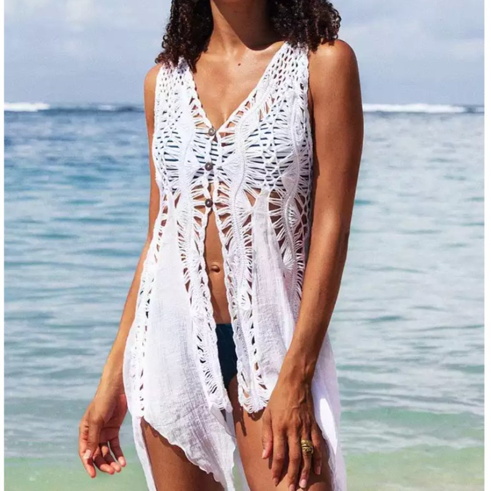 Crochet swim coverup with buttons.